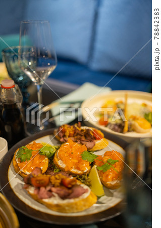 delicious dishes on the table in the restaurant. serving table. sharpness in the middle of the table. 78842383