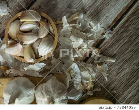 The garlic on wood table for food or cooking concept. 78844059