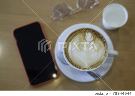 Coffee cup hot latte on wooden table 78844944