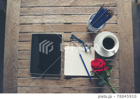 Top view office desk laptop and coffee cup on wood table copy space. Tabletop notebook laptop coffee cup for officer display empty space on wooden background. Home business work from home workspace 78845910