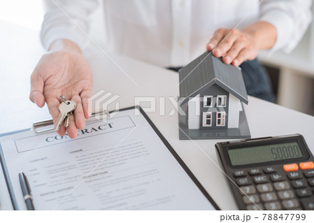 Real estate agents helping to buy, sell, and rent real estate and organizing transactions between buyers and sellers Real estate agents helping to buy, sell, and rent real estate and organizing transactions between buyers and sellers 78847799
