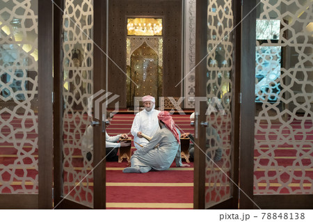 muslim people in mosque reading quran together muslim people in mosque reading quran together 78848138