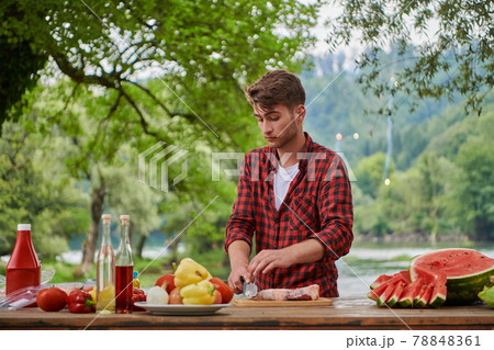 man cooking tasty food for french dinner party man cooking tasty food for french dinner party 78848361