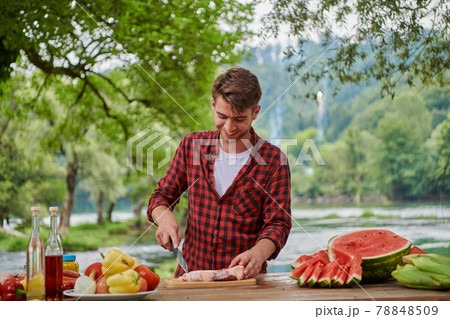 man cooking tasty food for french dinner party man cooking tasty food for french dinner party 78848509