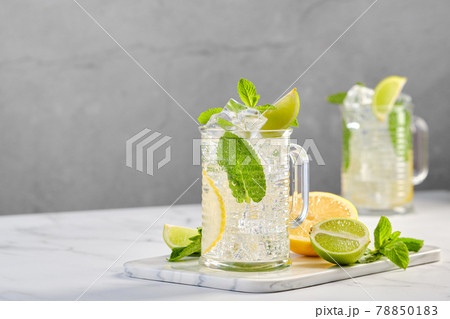 Two glasses of lemon, lime and mint cold lemonade 78850183