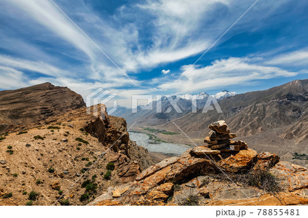 View of Spiti valley Himalayas with stone cairn . Spiti valley, Himachal Pradesh, India View of Spiti valley Himalayas with stone cairn . Spiti valley, Himachal Pradesh, India 78855481