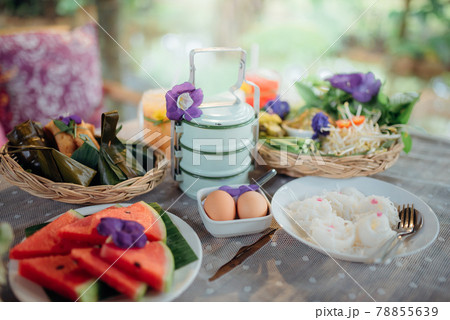 A set of traditional Thai food, dessert, drink, and fresh seasonal fruits. 78855639