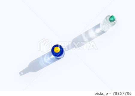 Plastic water bottles on white surface Plastic water bottles on white surface 78857706