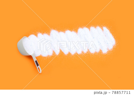 Detergent powder with measuring spoon for clothes washing. Laundry concept. 78857711