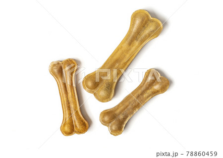 bone for dogs isolated on white background Top view Flat lay Delicious treat for your beloved pet Food for animals concept 78860459