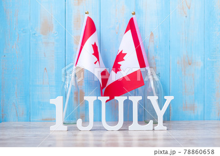 Wooden calendar of July 1st with miniature Canada flags. Canada Day and happy celebration concepts Wooden calendar of July 1st with miniature Canada flags. Canada Day and happy celebration concepts 78860658