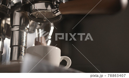 closeup of rinsing espresso coffee machine in the morning 78863407