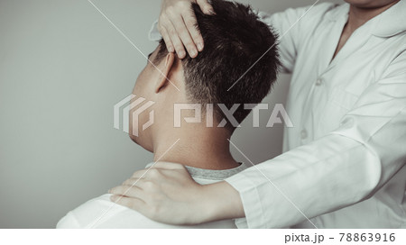 Physical therapy, Female physiotherapist examined the neck injuries of a male patient attending the clinic, Bone arrangement, Non-surgical medical treatment, Modern medical techniques. 78863916