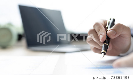 Financial businessman analyze the graph of the company's performance to create profits and growth, Market research reports and income statistics, Financial and Accounting concept. 78865493