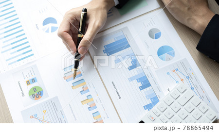 Financial businessman analyze the graph of the company's performance to create profits and growth, Market research reports and income statistics, Financial and Accounting concept. 78865494