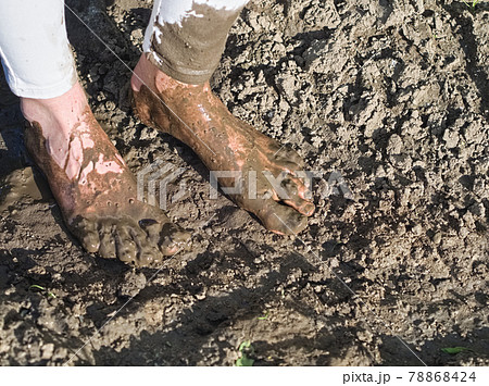 Muddy Feet of a Young Woman Muddy Feet of a Young Woman 78868424