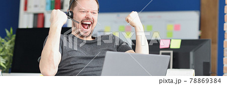 Joyful disabled streamer plays online games closeup 78869384