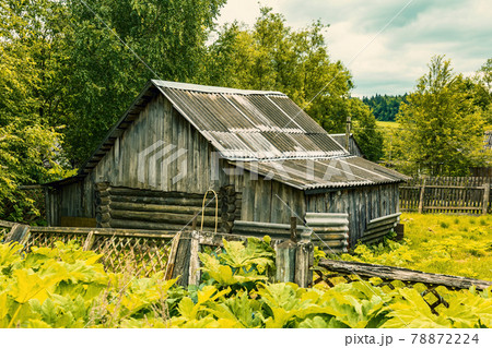 Part of the old facade of an abandoned village house Part of the old facade of an abandoned village house 78872224