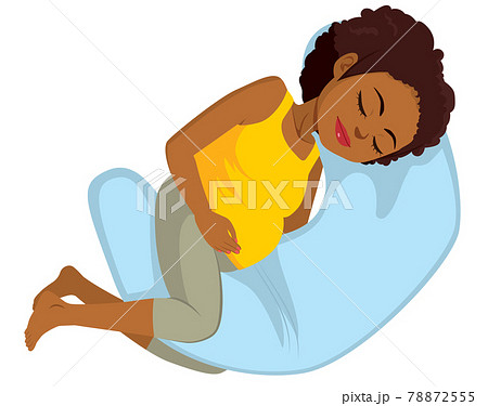 Black pregnant woman sleeping on comfortable pillow isolated on white background Black pregnant woman sleeping on comfortable pillow isolated on white background 78872555