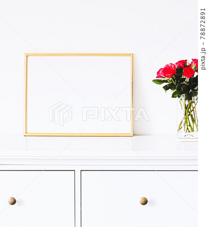 Golden frame on white furniture, luxury home decor and design for mockup, poster print and printable art, online shop showcase 78872891