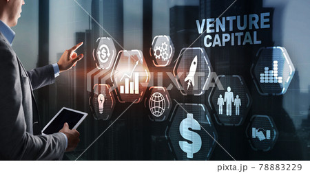 Venture capital. Investor capital. Businessman pressing virtual screen inscription 78883229