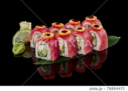 Philadelphia rolls with tuna, kumquat and unagi sauce 78884455