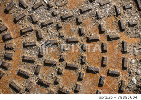 Rusty sewer manhole cover Rusty sewer manhole cover 78885604