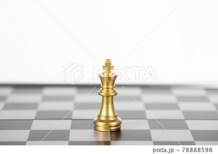 The gold king chess alone on the chess board , business strategy 78888598