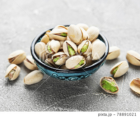 Bowl with pistachios Bowl with pistachios 78891021