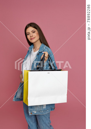 beautiful woman holding shopping bags with purchases beautiful woman holding shopping bags with purchases 78892286