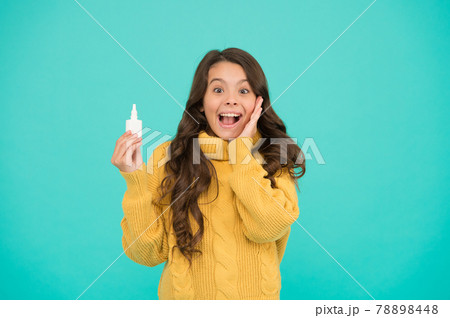 Seasonal allergy. Kid use effective medicines. Girl hold 78898448