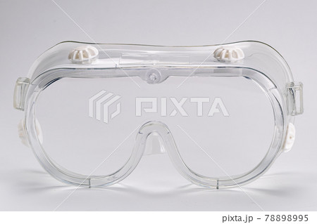 Side view of transparent safety protective goggles isolated on white background. 78898995
