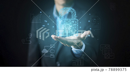 Businessman holding Big key Security to online Shopping  and icons in graph Screen Icon of a media screen,Technology Process System Business concept. online Shopping and Protection Hacker concept. 78899375