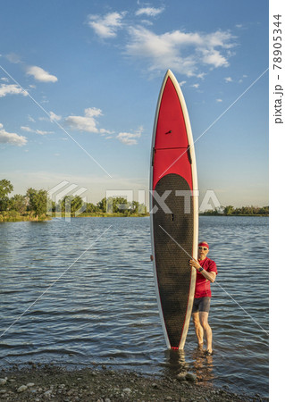 paddler and paddlleboard paddler and paddlleboard 78905344