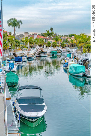 Boats and docks lining the canal at a scenic tourist destination in Long Beach Boats and docks lining the canal at a scenic tourist destination in Long Beach 78906009