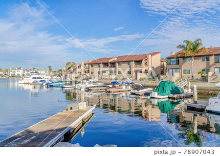 Beautiful harbour views with boats and docks in Huntington Beach California Beautiful harbour views with boats and docks in Huntington Beach California 78907043