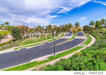 Roads and lush foliage on Huntington Beach California neighborhood landscape Roads and lush foliage on Huntington Beach California neighborhood landscape 78907204