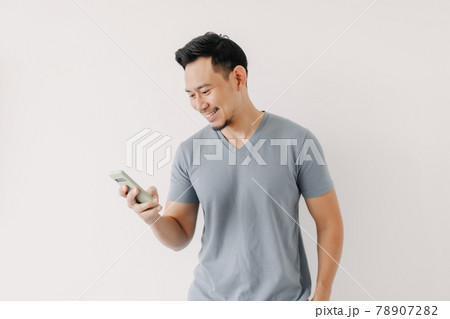 Happy man use smartphone isolated on white background. Happy man use smartphone isolated on white background. 78907282