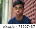 A Tired  Filipino Teenage Boy 78907437