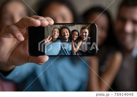 Close up four diverse mixed race best friends making selfie photo. 78914048