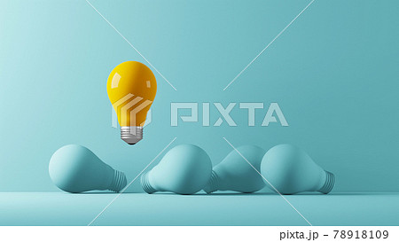 Light bulb yellow floating outstanding among lightbulb light blue on background 78918109
