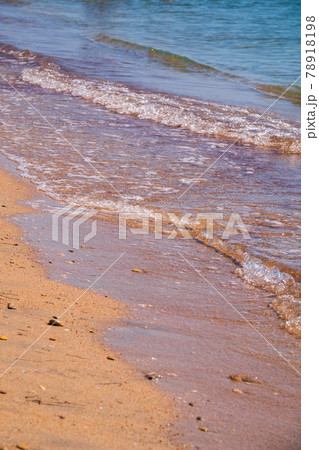 Soft wave of the sea on the sandy beach. Soft wave of the sea on the sandy beach. 78918198