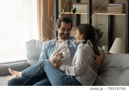 Relaxed happy family couple enjoying trusted conversation at home. Relaxed happy family couple enjoying trusted conversation at home. 78919768