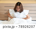 Woman having painful stomachache 78926207