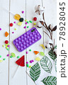 Phone case with pop it on white wooden background 78928045