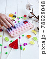 Phone case with pop it on white wooden background 78928048