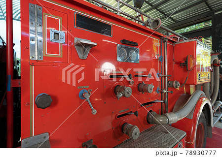 Close up of a fire truck machine engine components, an emergency accident rescue safty and security equipment in station. Ambulance. Service. Close up of a fire truck machine engine components, an emergency accident rescue safty and security equipment in station. Ambulance. Service. 78930777