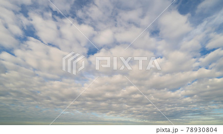 Clear blue sky with white fluffy clouds at noon. Day time. Abstract nature landscape background. 78930804