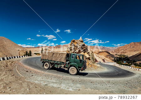 Indian army lorry on road in Himalayas 78932267