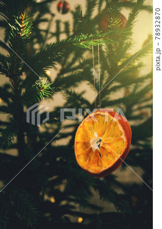 Holiday decorations, Christmas tree toy - dried orange slice. Holiday decorations, Christmas tree toy - dried orange slice. 78932870
